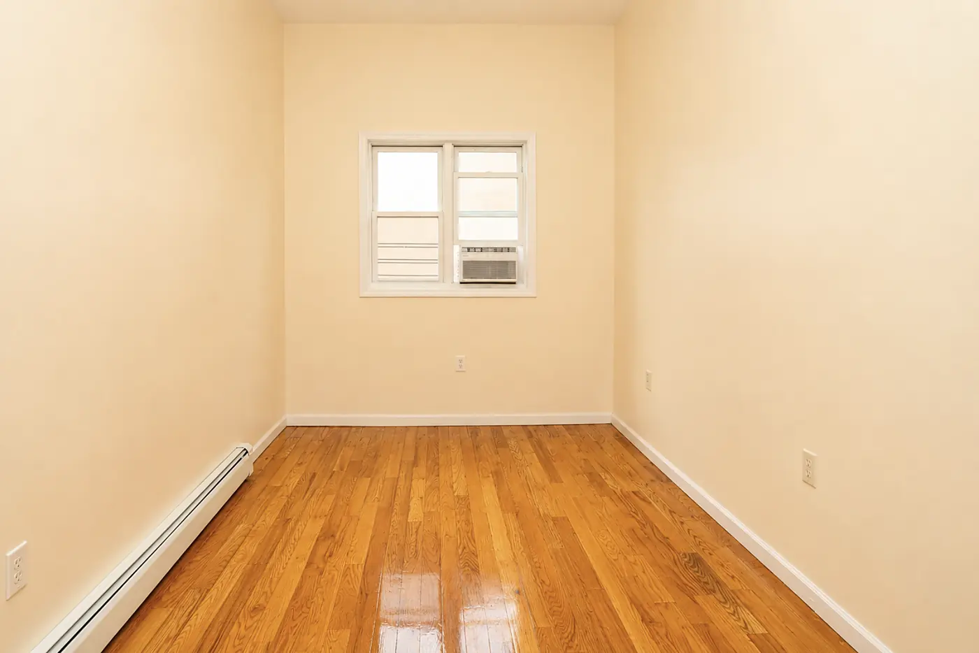 First bedroom looking toward the window