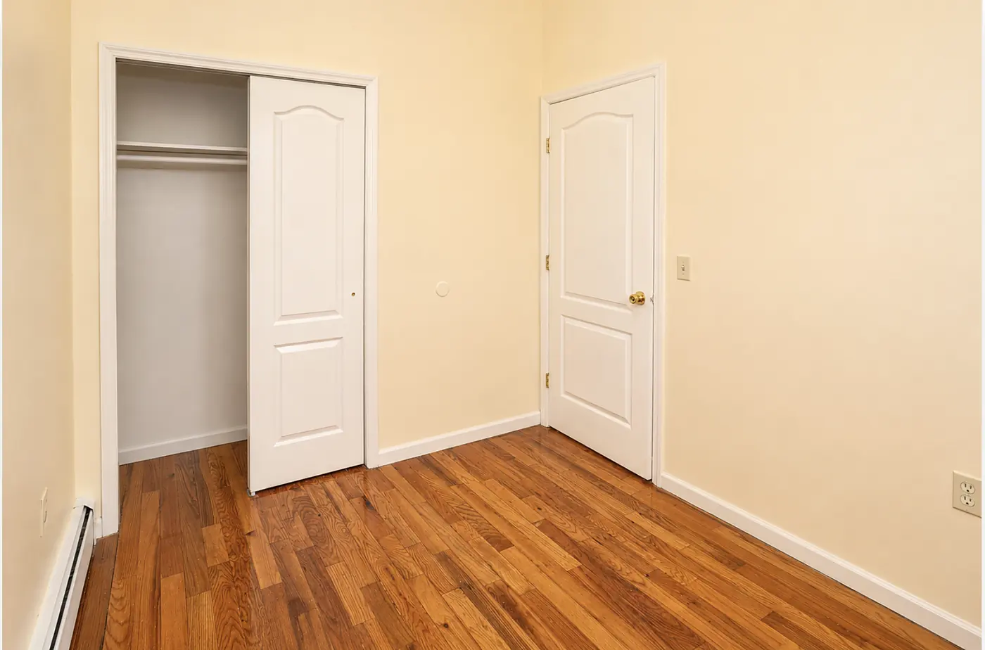 Third bedroom with a wide sliding closet